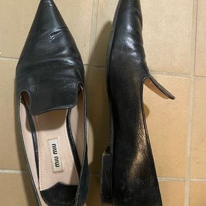 Miu Miu black flats.